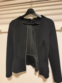 Sale H&M Divided Black blazer with front zipper.