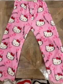 New Corteiz pink used beanie and new hellow kitty pants