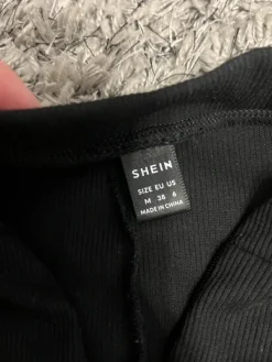 Online Czarny kombinezon