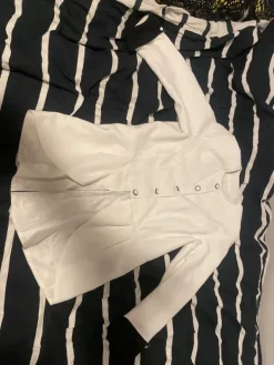 Online Kaunis valkoinenpäällys takki