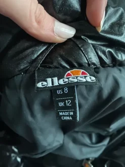 Hot Ellesse Musta glitter toppatakki