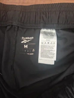 Online Reebok Miesten ohuet urheiluhousut