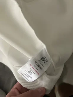 Online Siksilk in valko/musta verkkatakki.