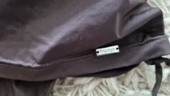 Triumph uimapuku jossa helma