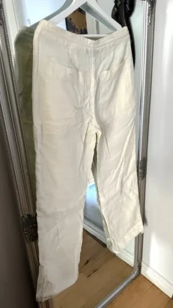 H&M Vaaleat miesten -merkkiset pellavahousut, koko 31