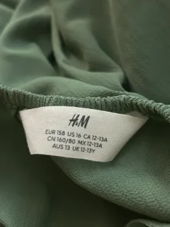 H&M vihreä haalari