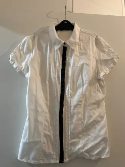 Hot ORSAY White shirt with little ribbons.